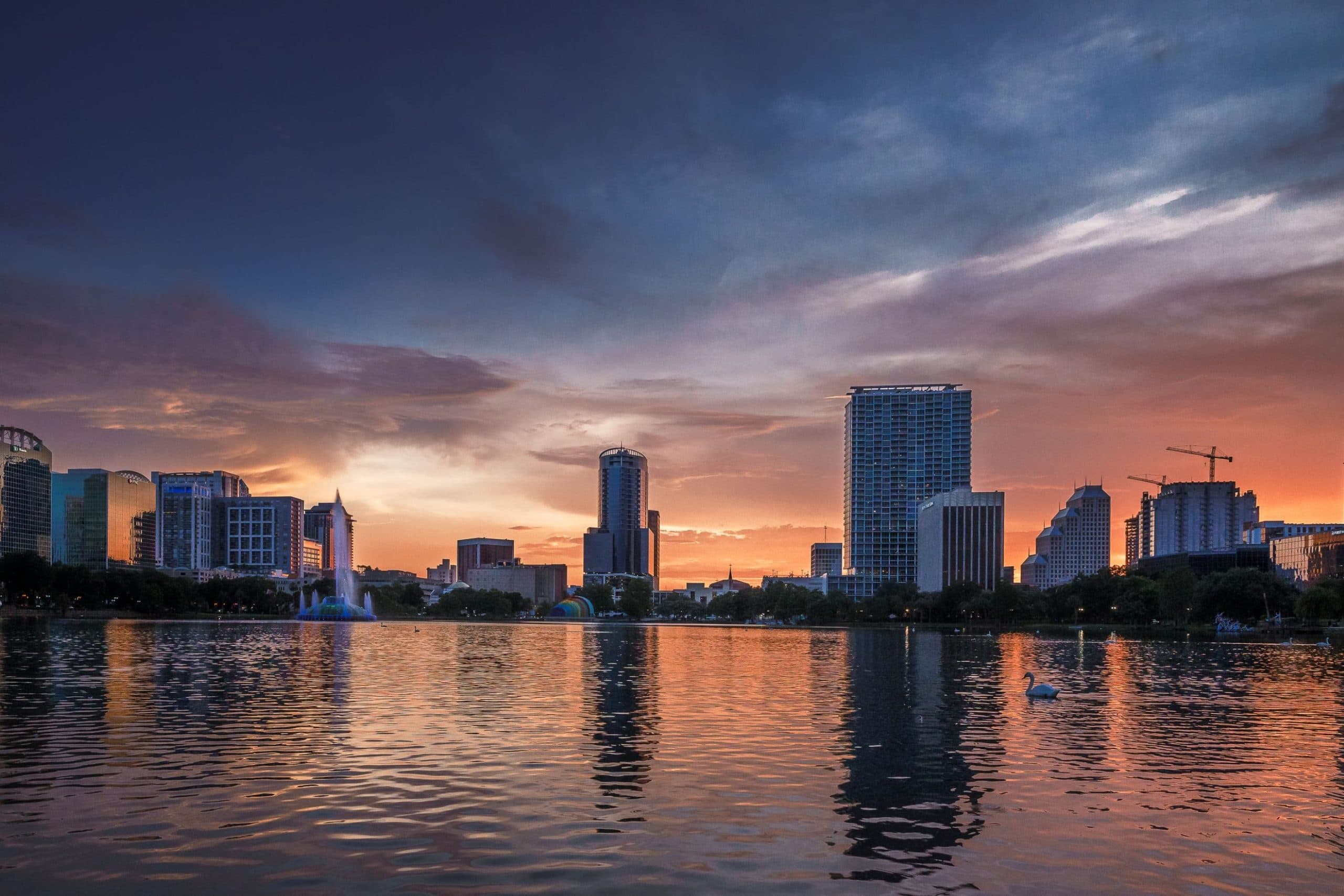 Sunset with a view of Lake Eola and the Eola Center.