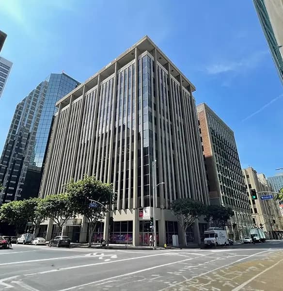 Exterior street view of Opus' modern Los Angeles location at 626 Wilshire Blvd, Los Angeles.