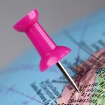 Globe with pin in West Coast as target market