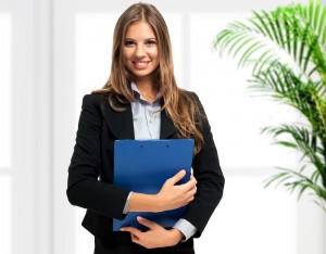 business woman standing with files