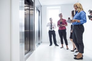 Are virtual offices safe? A few people stand around their business address thinking about safety concerns.